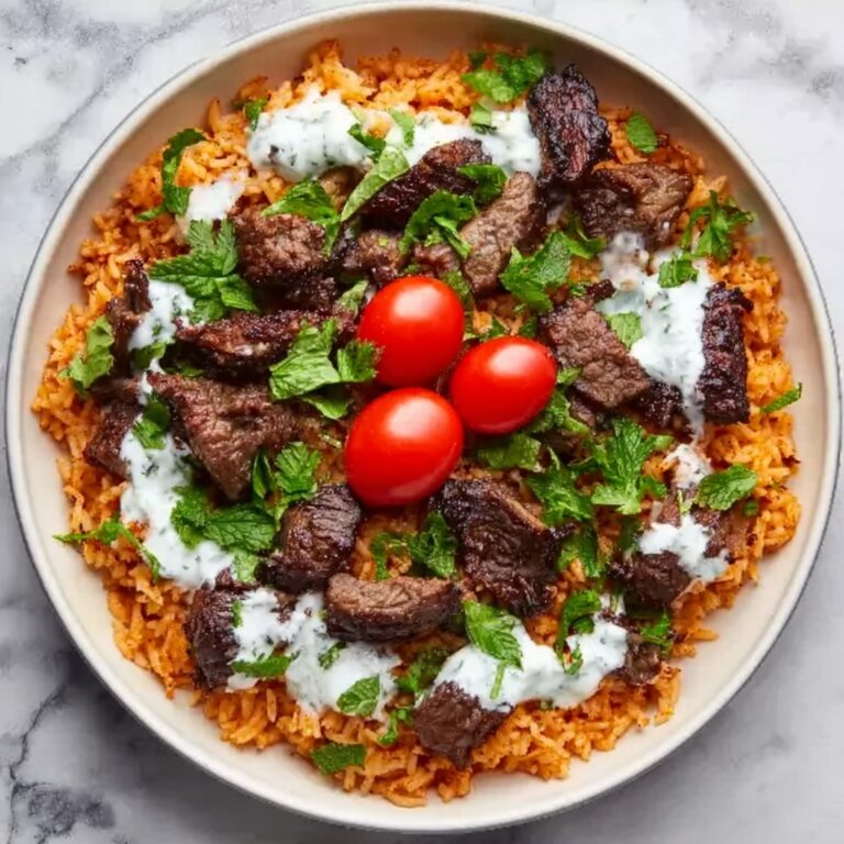 Creamy Queso Rice with Juicy Steak Strips Recipe
